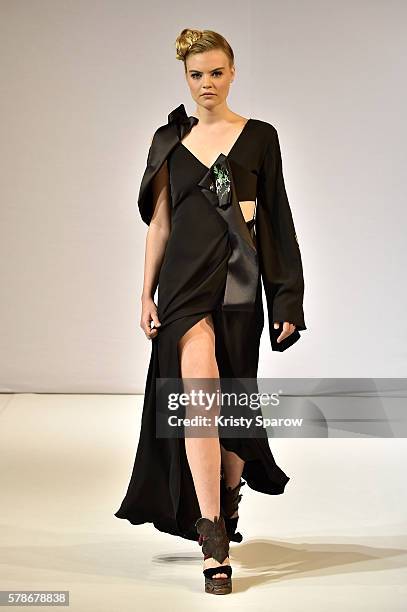 Model walks the runway during the Patuna Haute Couture Fall/Winter 2016-2017 show as part of Paris Fashion Week on July 4, 2016 in Paris, France.