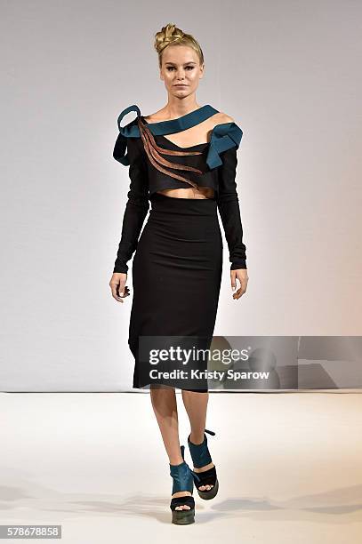 Model walks the runway during the Patuna Haute Couture Fall/Winter 2016-2017 show as part of Paris Fashion Week on July 4, 2016 in Paris, France.