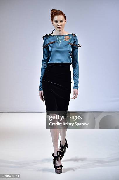 Model walks the runway during the Patuna Haute Couture Fall/Winter 2016-2017 show as part of Paris Fashion Week on July 4, 2016 in Paris, France.