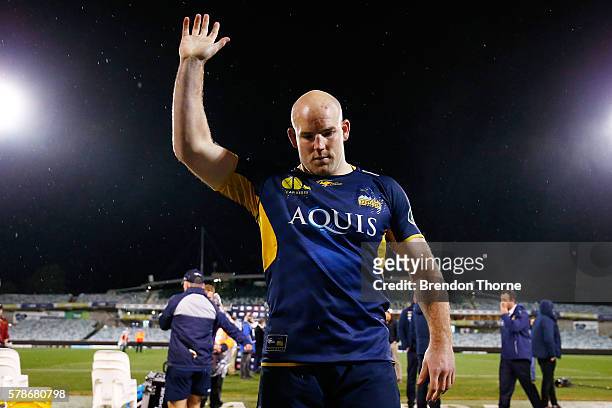 Stephen Moore of the Brumbies waves to fans as he leaves the field for the last time as a Brumbies player following the Super Rugby Quarterfinal...