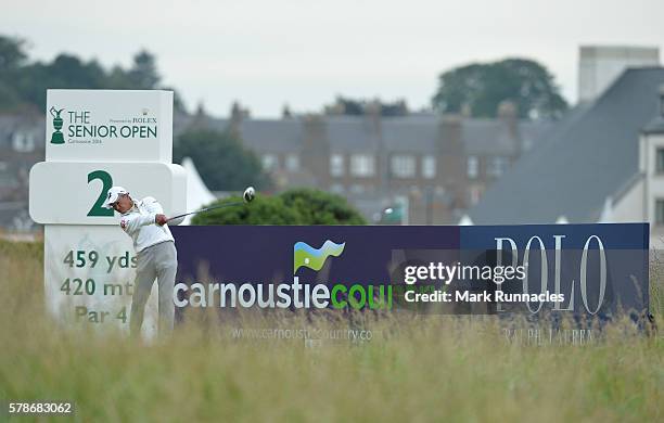 Kohki Idoki of Japan tee shot to the 2nd hole during the second day of The Senior Open Championship at Carnoustie Golf Club on July 22, 2016 in...