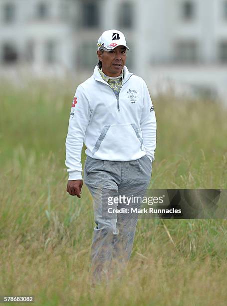 Kohki Idoki of Japan walks from the 2nd tee during the second day of The Senior Open Championship at Carnoustie Golf Club on July 22, 2016 in...