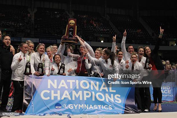 The Oklahoma Sooners celebrate their national championship after the finals of the 2014 NCAA Gymnastics Championships. The championships are located...