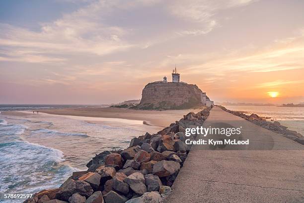 Nobbys Tuff Rocks 48 Nobbys Lighthouse Stock Photos, High-Res Pictures, and Images ...