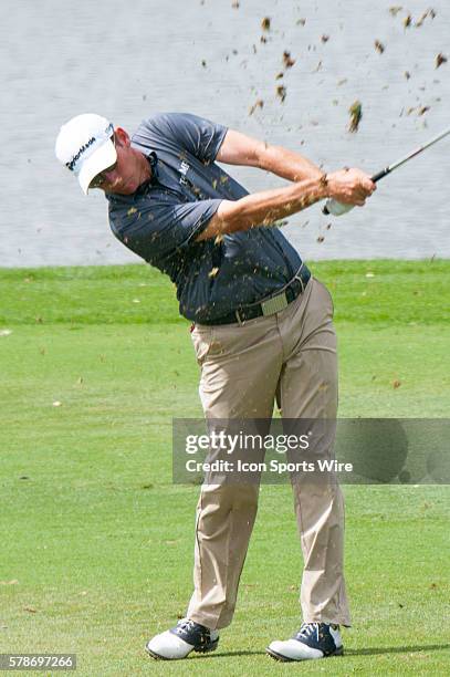 Jim Herman swings on the 6th green in the Third round of The Honda Classic at PGA National Resort & Spa - Champion Course in Palm Beach Gardens, FL.