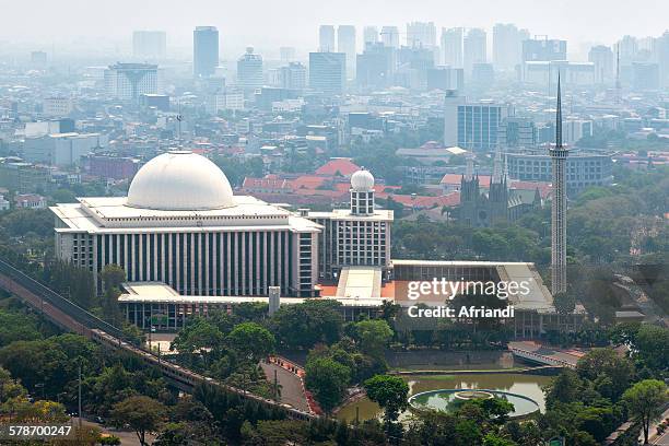 view of jakarta, indonesia - istiqlal stock pictures, royalty-free photos & images