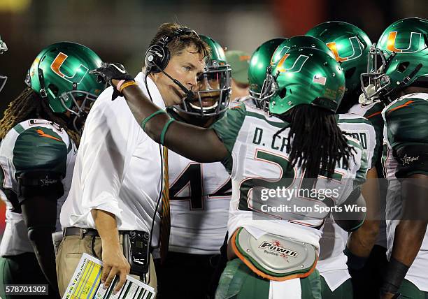 Miami Head Coach Al Golden in the game between the Miami [FL] Hurricanes and the Louisville Cardinals at Papa John's Cardinal Stadium in Louisville,...