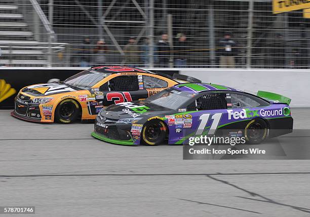 Ryan Newman Richard Childress Racing Caterpillar Chevrolet SS and Denny Hamlin Joe Gibbs Racing FedEx Ground Toyota Camry during the Sprint Cup...