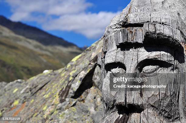 carved face, detail - obergurgl stock pictures, royalty-free photos & images