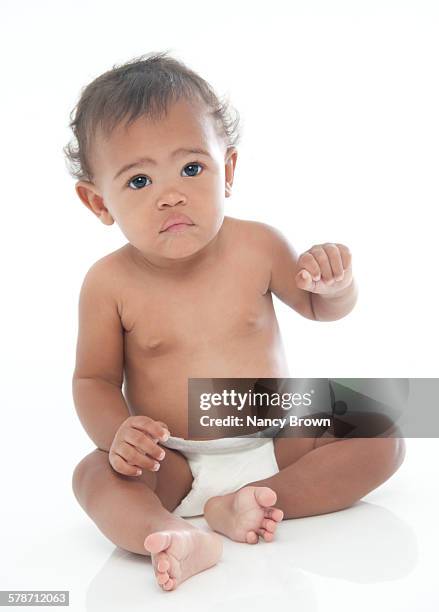 african american baby sitting on white - 4 months stock pictures, royalty-free photos & images
