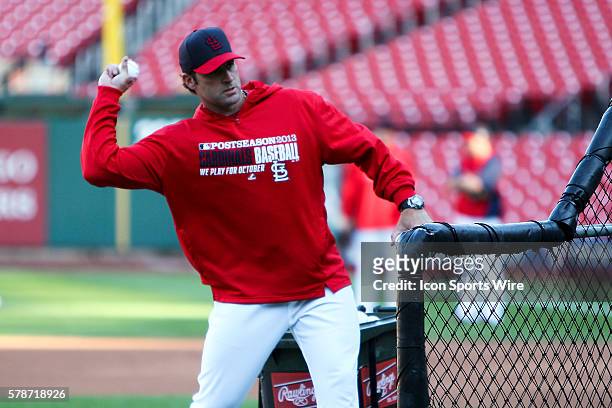 St. Louis Cardinals manager Mike Matheny throws batting practice pitches prior to game six of the NLCS Playoffs against the Los Angeles Dodgers at...