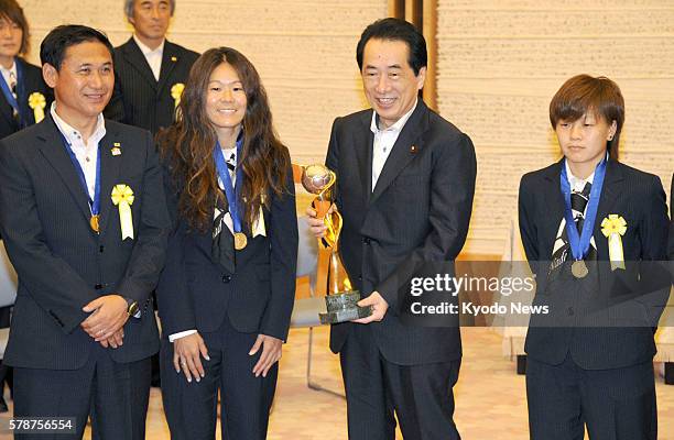 Tokyo, Japan - Members of the world champion ''Nadeshiko Japan'' national women's soccer team -- including captain Homare Sawa , Aya Miyama and coach...