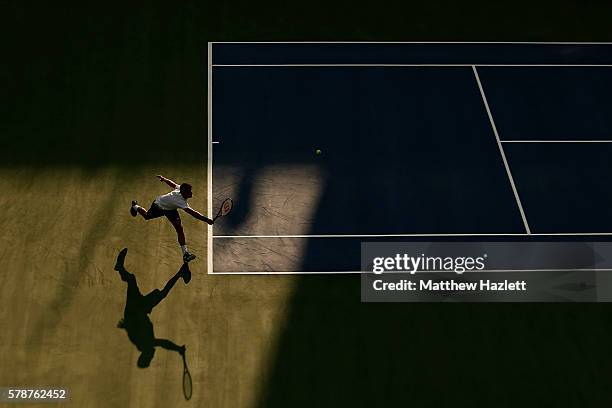 Grigor Dimitrov of Bulgaria returns a shot to Daniel Evans of Great Britain during day 2 of the Citi Open at Rock Creek Tennis Center on July 19,...