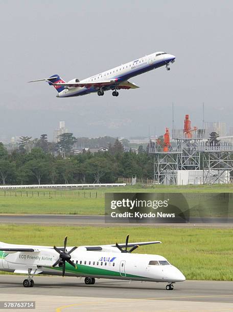 Japan - The first of the resumed regular domestic flights takes off from Sendai airport in Miyagi Prefecture, northeastern Japan, on July 25, 2011....