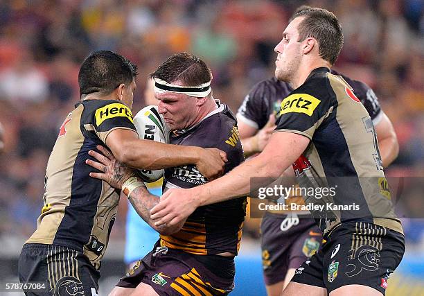 Josh McGuire of the Broncos takes on the defence during the round 20 NRL match between the Brisbane Broncos and the Penrith Panthers at Suncorp...