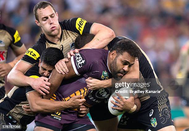 Sam Thaiday of the Broncos is tackled during the round 20 NRL match between the Brisbane Broncos and the Penrith Panthers at Suncorp Stadium on July...