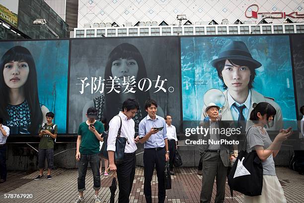 Pokemon players plays in front of Shibuya station as &quot;Pokemon Go&quot; finally launches it's first day in Japan on Friday, July 22, 2016.