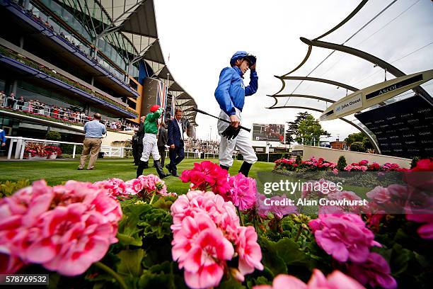 Jockey James Doyle makes his way to the parade ring at Ascot Racecourse on July 22, 2016 in Ascot, England.