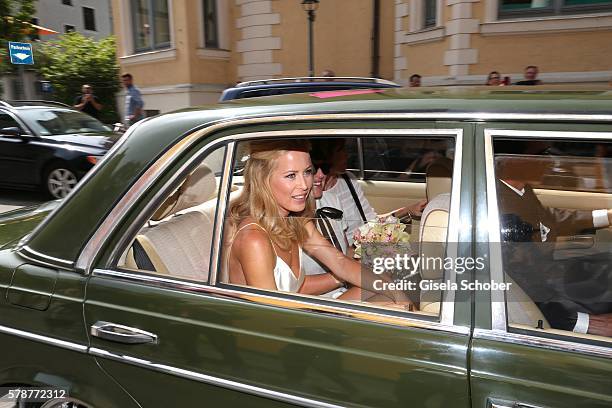 Bride Carina Wanzung arrives to her wedding of Mario Gomez and Carina Wanzungat registry office Mandlstrasse on July 22, 2016 in Munich, Germany.