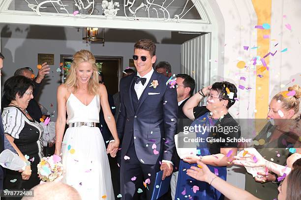 Bridegroom Mario Gomez and his wife Carina Wanzung during the wedding of Mario Gomez and Carina Wanzung at registry office Mandlstrasse on July 22,...