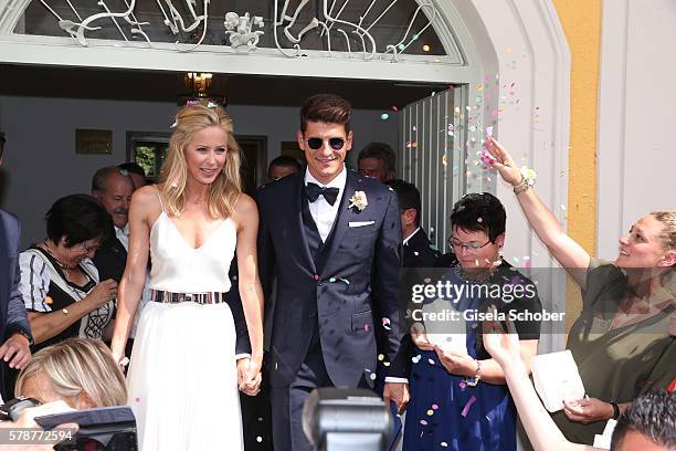 Bridegroom Mario Gomez and his wife Carina Wanzung during the wedding of Mario Gomez and Carina Wanzung at registry office Mandlstrasse on July 22,...