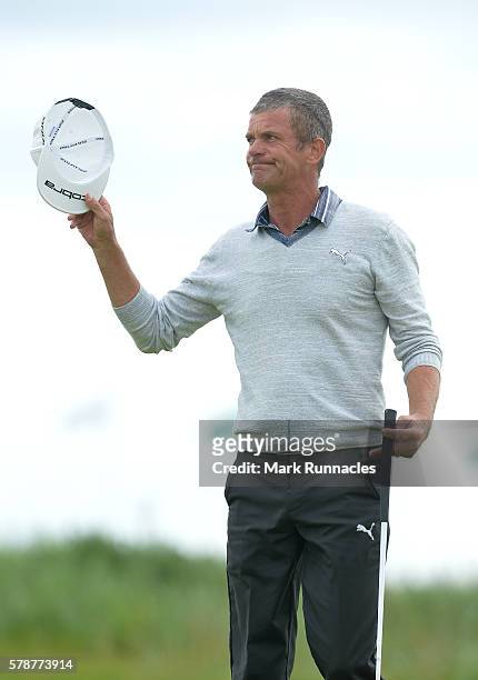 Jesper Parnevik of Sweden waves as he finishes his round on 18 during the second day of The Senior Open Championship at Carnoustie Golf Club on July...