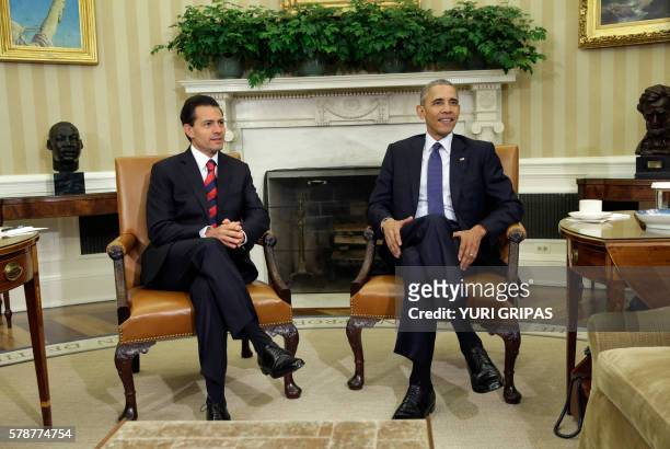President Barack Obama meets with Mexican President Enrique Pena Nieto in the Oval Office of the White House in Washington,DC on July 22, 2016.