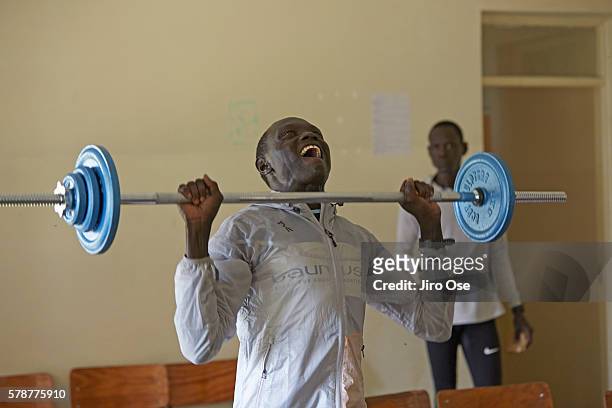 Summer Games Preview: View of Refugee Olympic Team Paulo Amotun Lokoro in action, lifting weights at the Tegla Lorupe Training Center. The IOC...