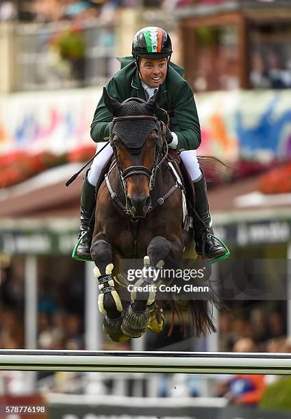 Dublin , Ireland - 22 July 2016; Cian O'Connor, Ireland, clears the last hurdle competing on Good Luck, during the Furusiyya FEI Nations Cup...