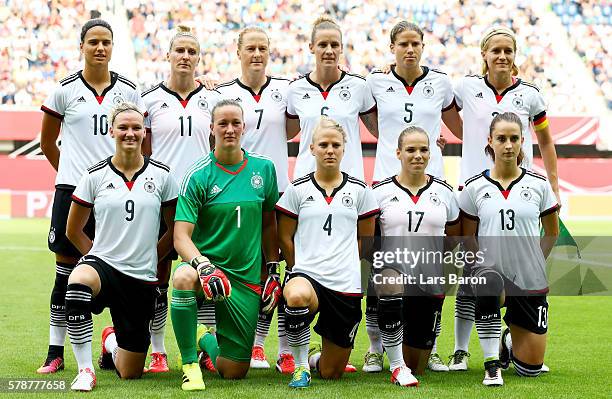 Players of Germnay pose during the women's international friendly match between Germnay and Ghana at Benteler Arena on July 22, 2016 in Paderborn,...