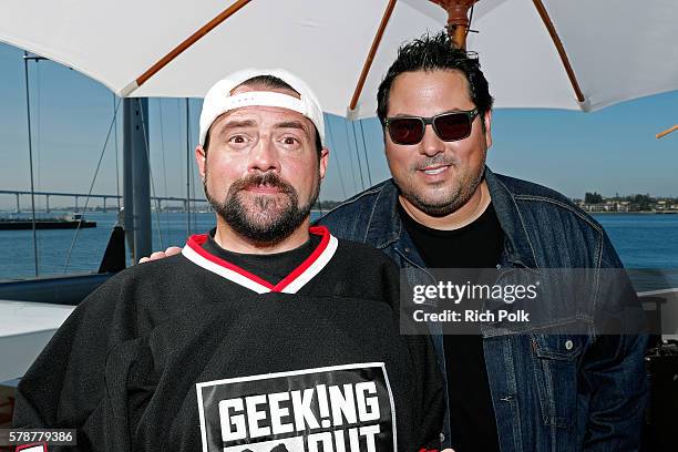 Host Kevin Smith and co-host Greg Grunberg attend the IMDb Yacht at San Diego Comic-Con 2016: Day Two at The IMDb Yacht on July 22, 2016 in San...