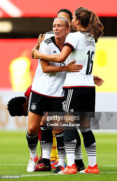 Mandy Islacker of Germany celebrates with team mates after scoring her teams tenth goal during the women's international friendly match between...