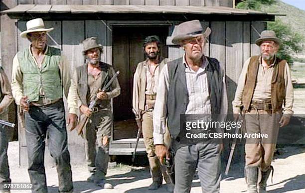 Theatrical movie originally released June 21, 1972. The film directed by Daniel Mann. Pictured left to right, Woody Strode , Ernest Borgnine , Roger...