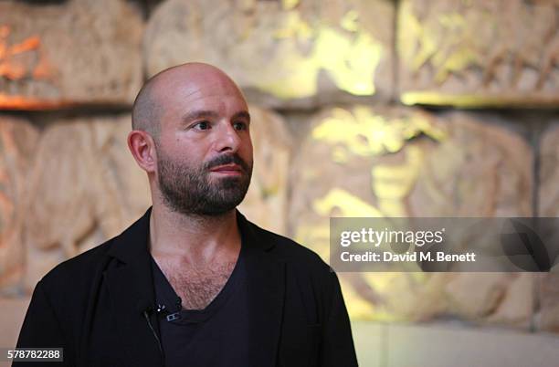 Actor Anatol Yusef reads "Poets, Warriors" by Gabriele Tinti at The British Museum on July 22, 2016 in London, England.