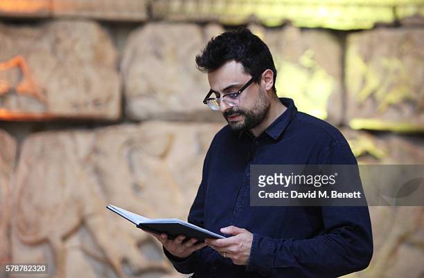 Gabriele Tinti reads from his poem "Poets, Warriors" at The British Museum on July 22, 2016 in London, England.