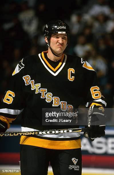Mario Lemieux of the Pittsburgh Penguins look during the game against the New York Islanders at the Nassau Coliseum on January 7, 1997 in Uniondale,...