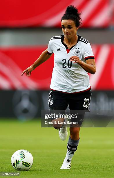 Lina Magull of Germany runs with the ball during the women's international friendly match between Germnay and Ghana at Benteler Arena on July 22,...