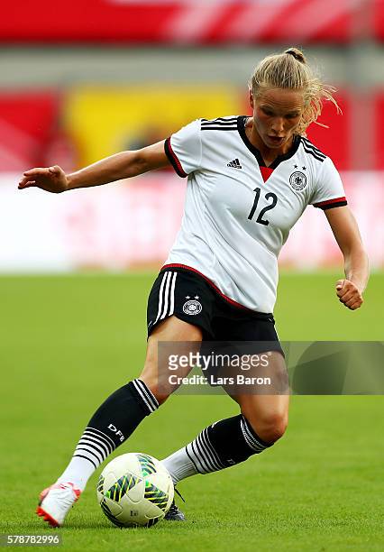 Tabea Kemme of Germany runs with the ball during the women's international friendly match between Germnay and Ghana at Benteler Arena on July 22,...