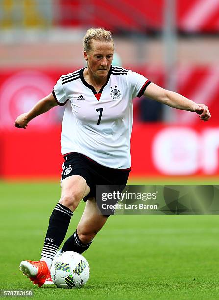 Melanie Behringer of Germany runs with the ball during the women's international friendly match between Germnay and Ghana at Benteler Arena on July...