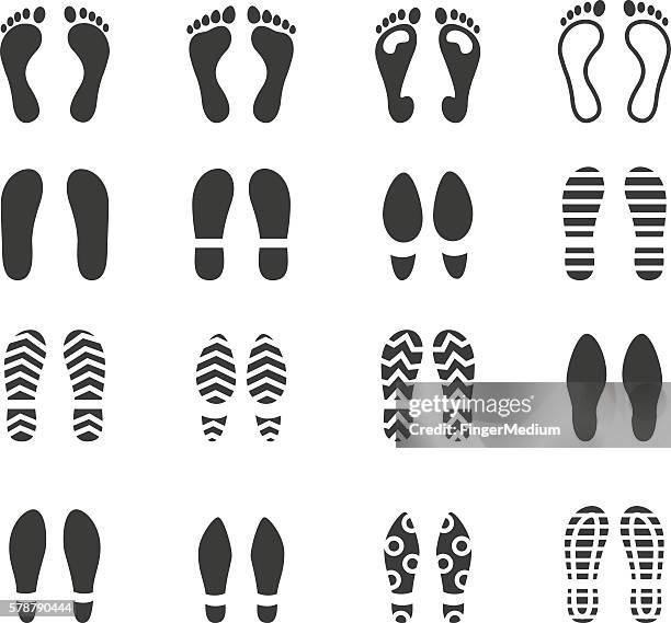 foot print icon set - shoe print vector stock illustrations