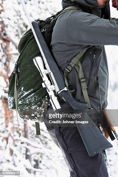 hunter at winter - gun pov foto e immagini stock