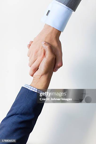 Strong Business Handshake Photos and Premium High Res Pictures - Getty ...