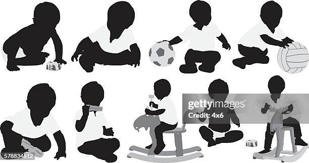little baby boy playing - kids indoor football stock illustrations