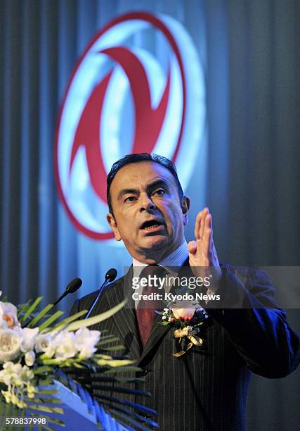 China - Nissan Motor Co. President and Chief Executive Officer Carlos Ghosn speaks at a press conference in Beijing on July 26 to announce the...