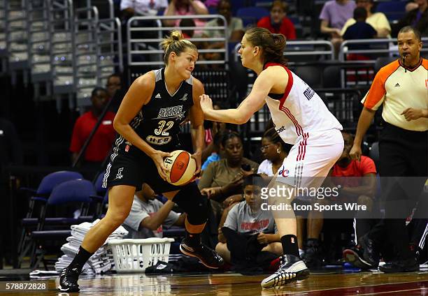 Emma Meesseman of the Washington Mystics defends against Jayne Appel of the San Antonio Stars during a WNBA game at Verizon Center, in Washington DC....