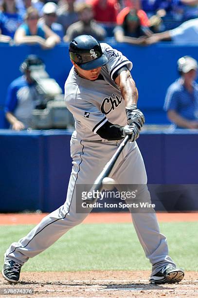 Chicago White Sox outfielder Moises Sierra makes contact with the ball at the plate. The Chicago White Sox defeated the Toronto Blue Jays 4 - 0 at...