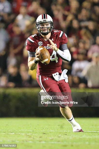 South Carolina Gamecocks quarterback Connor Shaw looks for a receiver at Williams-Brice Stadium, Columbia, South Carolina. South Carolina comes back...