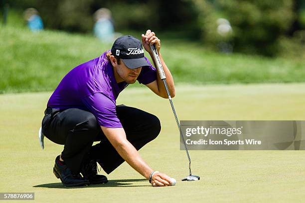 Andrew Loupe lines up his putt during the final round of the Quicken Loans National at Congressional Country Club in Bethesda, MD.