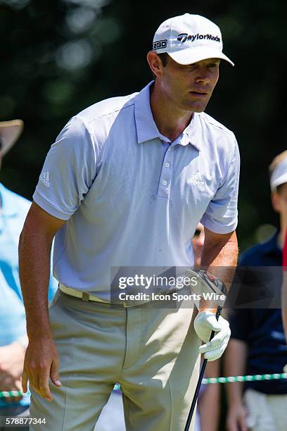 Scott Stallings follows his tee shot from the 4th tee box during the final round of the Quicken Loans National at Congressional Country Club in...