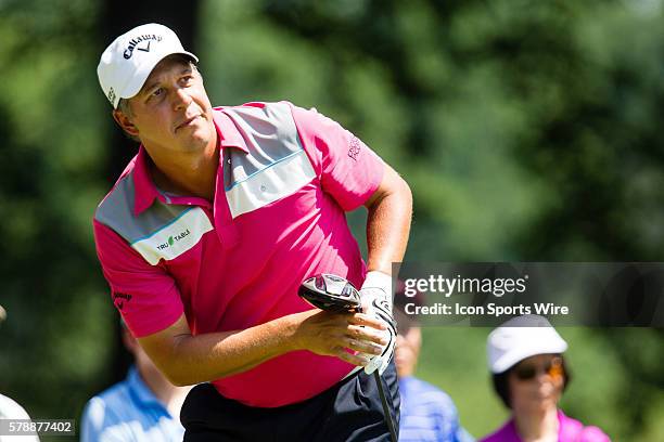 Freddie Jacobson follows his tee shot from the 4th tee box during the final round of the Quicken Loans National at Congressional Country Club in...